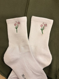 Calze in spugna con fiore ricamato